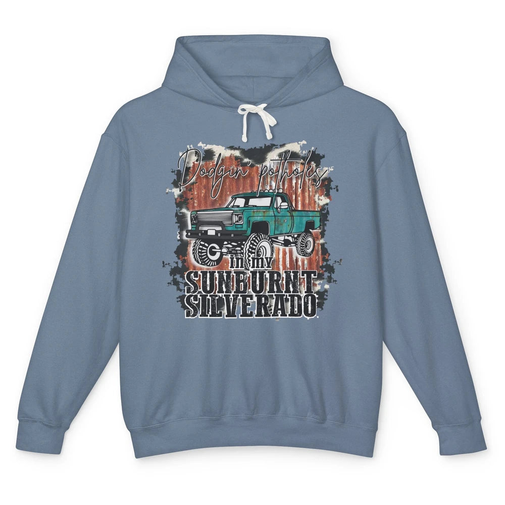 Cow Print Truck Dodging Potholes In My Sunburnt Western Girl Unisex Lightweight Hoodie